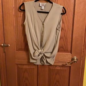 Adorable versatile tan button down blouse.